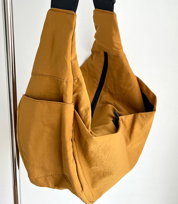 Casual unstructured sling purse for cycling and urban commuting