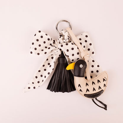 Close up detail of neat seam work on a retro patterned bow accessory