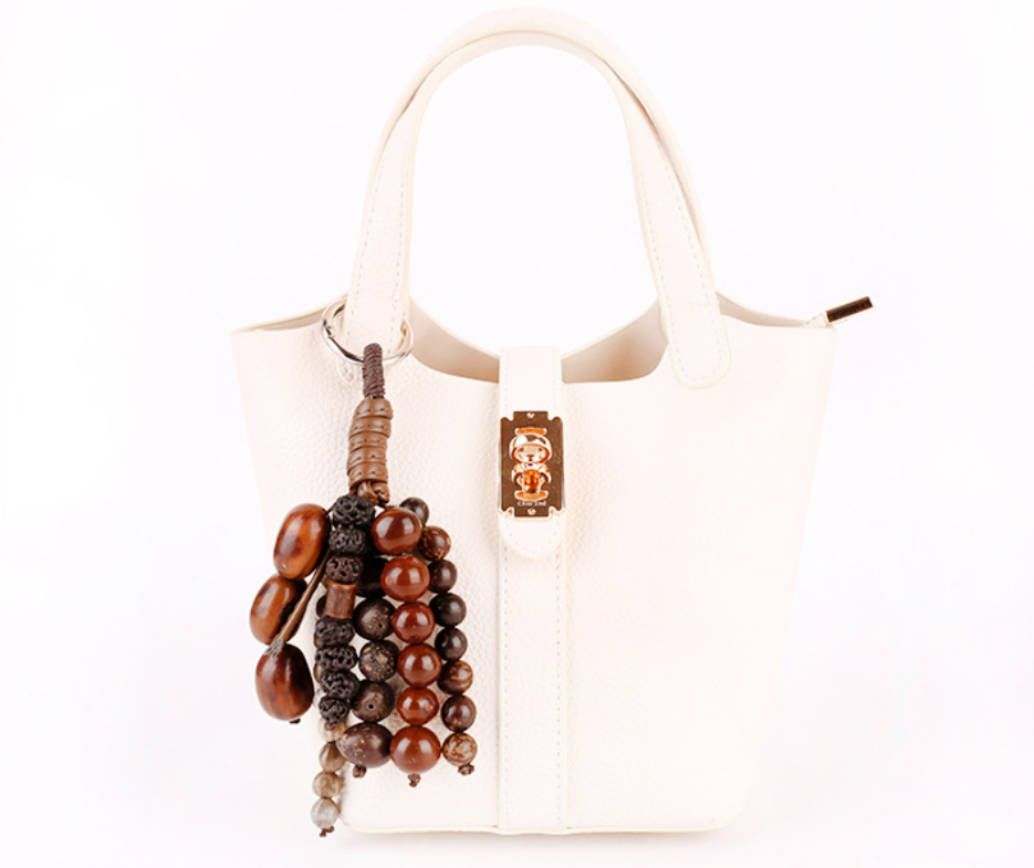Bohemian bag ornament with layered wooden beads