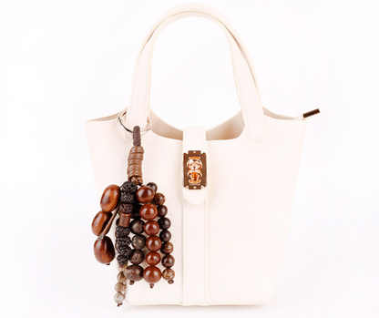 Bohemian bag ornament with layered wooden beads