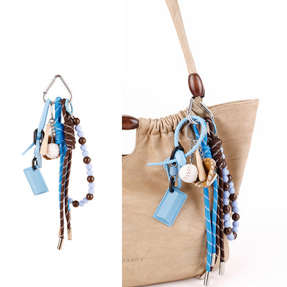 Earthy hanging charm designed for everyday handbags