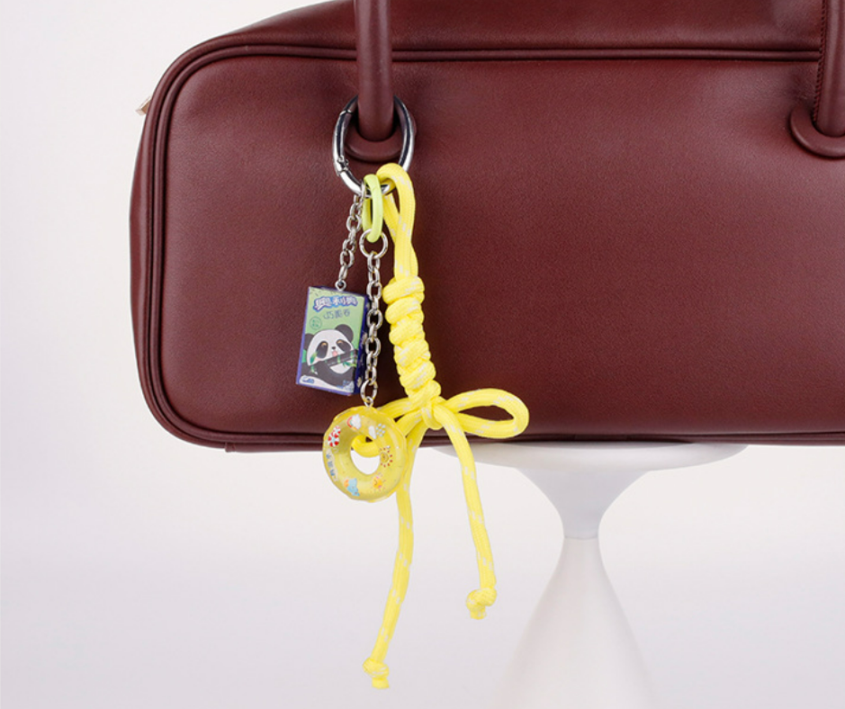 Sporty yellow keychain charm for gym duffel bags and everyday carry totes