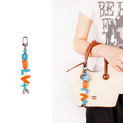 Chunky resin alphabet charm paired with car keys