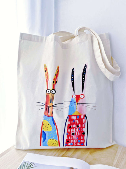 Detail of the imperfections in the hand-printed rabbit art on a cotton bag, showing the human touch that distinguishes it from mass-produced factory items.