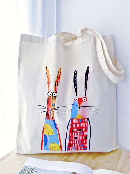 Detail of the imperfections in the hand-printed rabbit art on a cotton bag, showing the human touch that distinguishes it from mass-produced factory items.