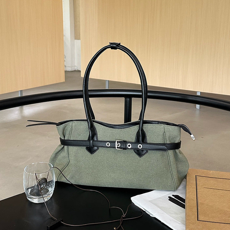 Canvas handbag with a neat and uncomplicated profile