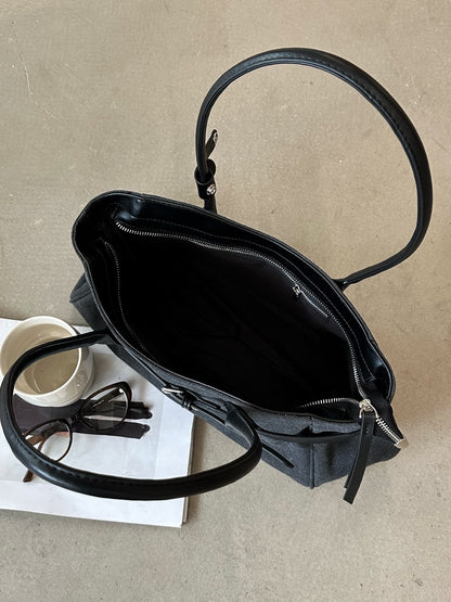 A fabric shoulder bag for daily trips around town
