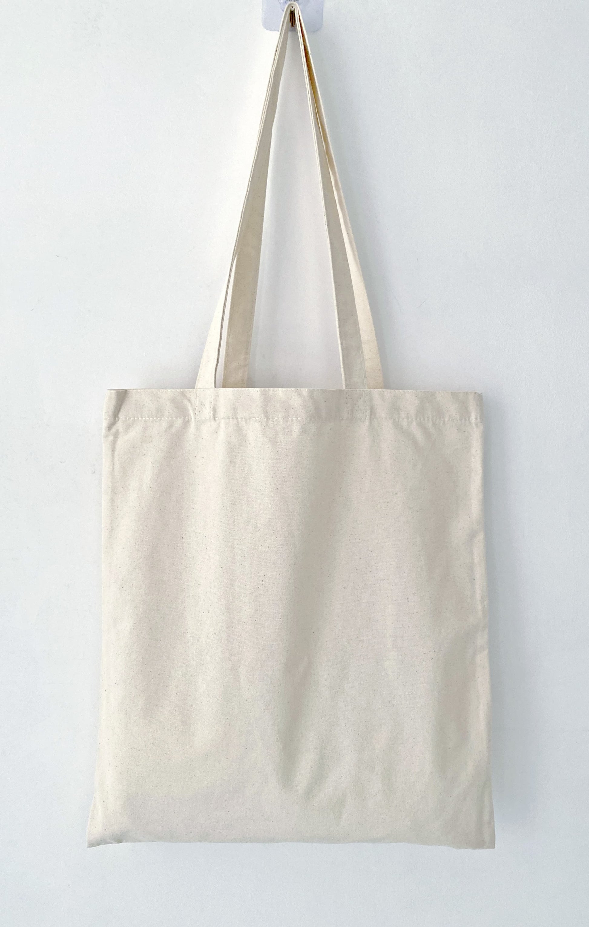 Soft cotton tote featuring an original handprinted bunny design for relaxed everyday errands