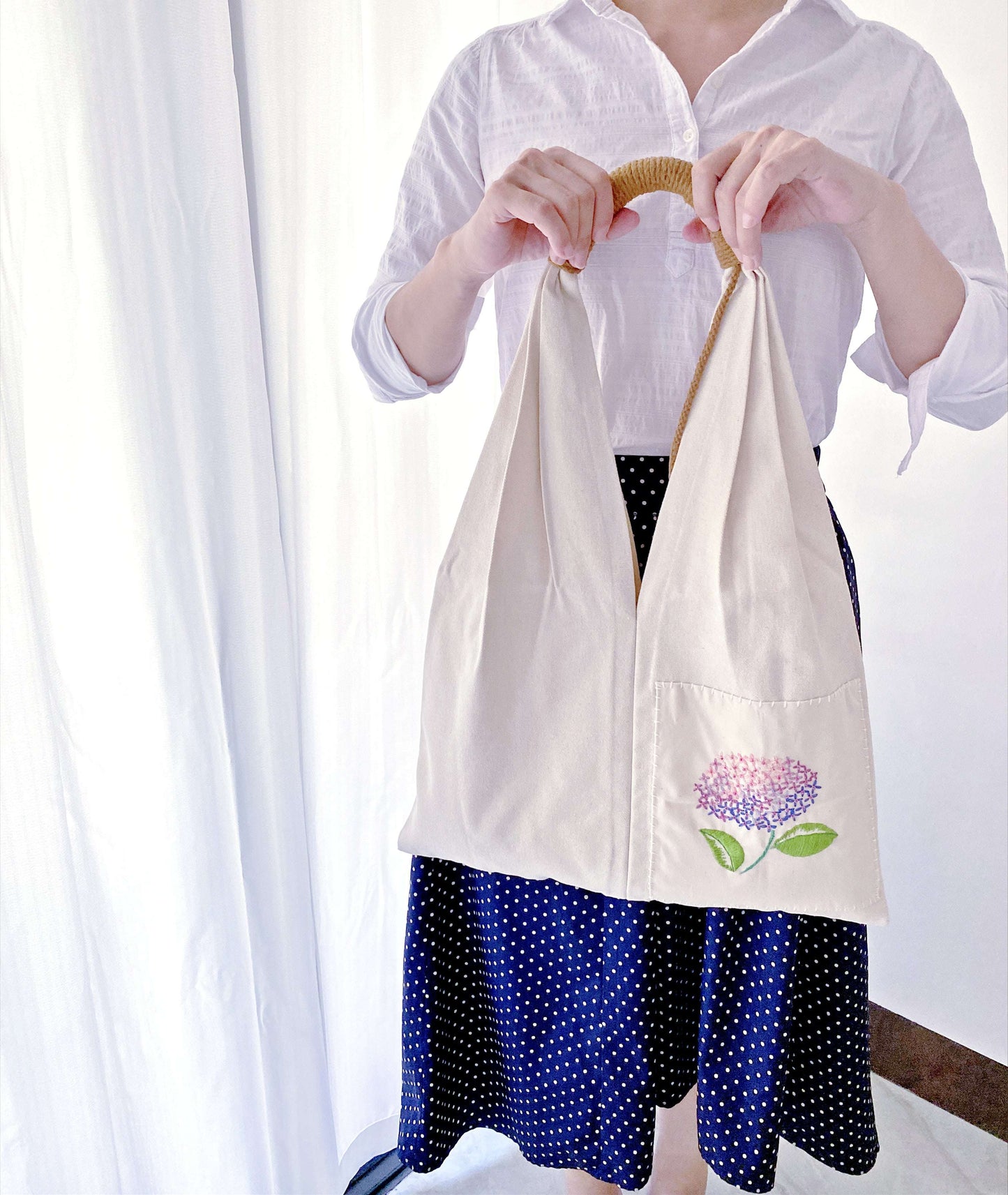 canvas tote with subtle embroidery for someone who likes unique details