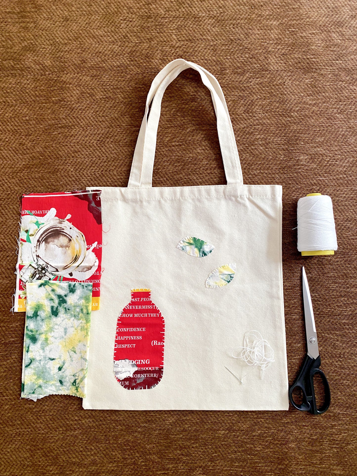 Everyday canvas tote with handmade patchwork detail used for library and book carrying