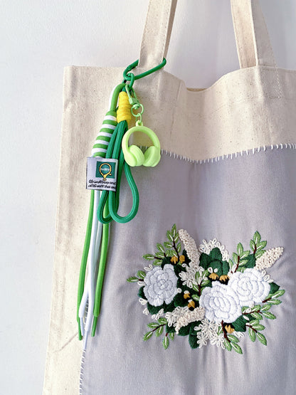 canvas shoulder bag with hand embroidered flowers for a meaningful present