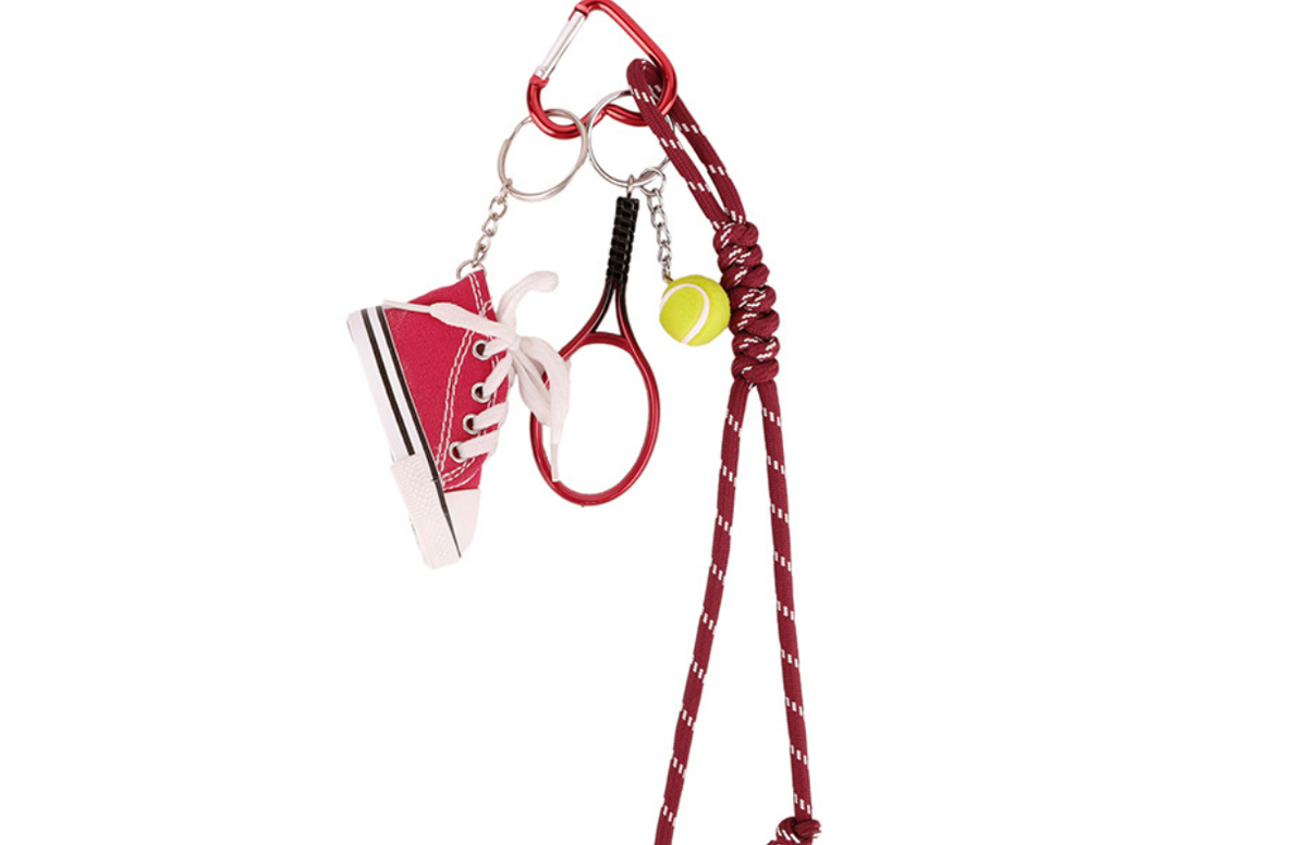 Carabiner keychain charm attached to a handbag