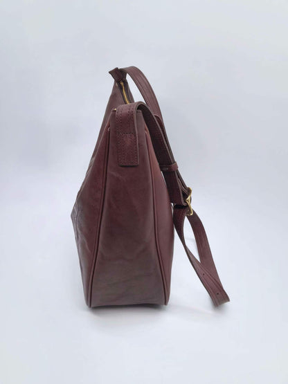 Crossbody purse styled for browsing bookshops and independent stores