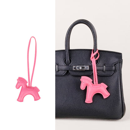 PU leather horse charm with scarf and tassel details