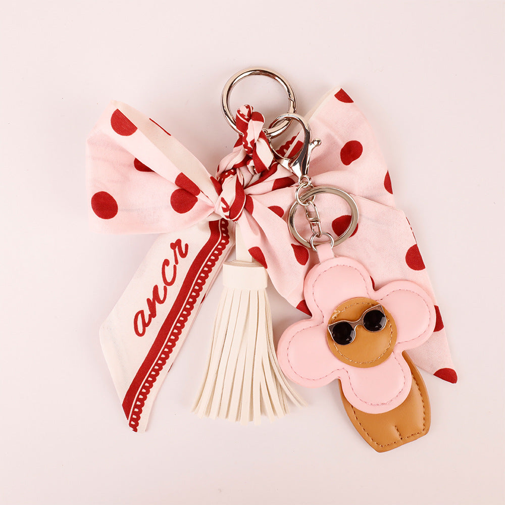 Polka dot bow bag decoration for a casual backpack