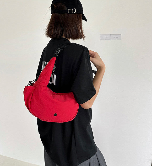 Small crescent crossbody bag for hands-free daily activities