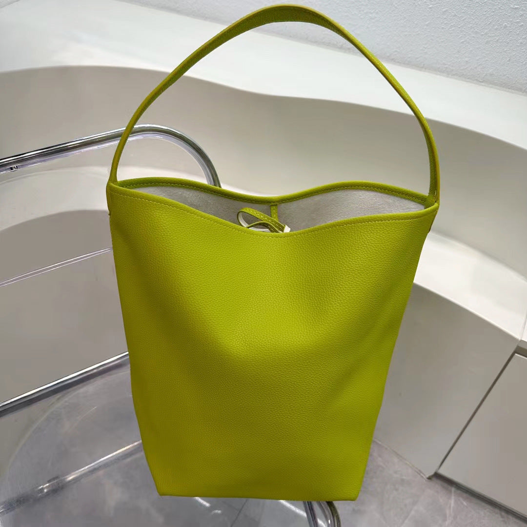 Leather drawstring bucket bag for weekend trips