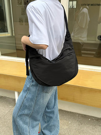 Generously sized crossbody for personal essentials