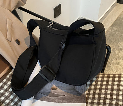 Compact crossbody bag for running quick errands