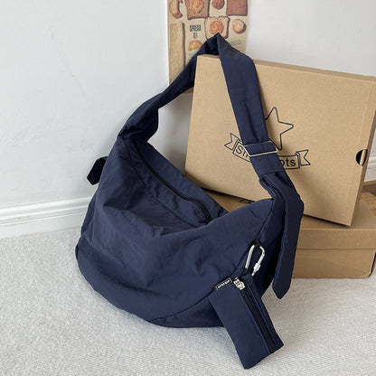 Wide strap crossbody bag for daily essentials