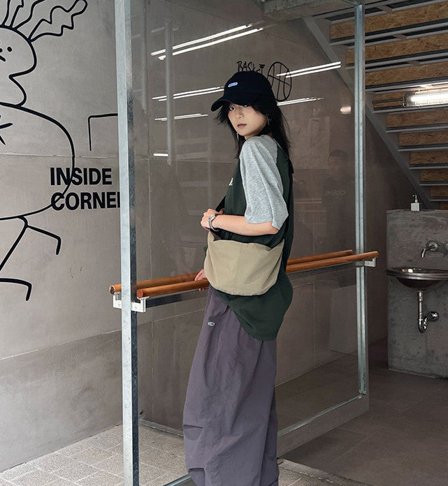 Compact crossbody pouch for daily essentials