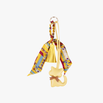 Cute cat bag charm with a flowing scarf detail