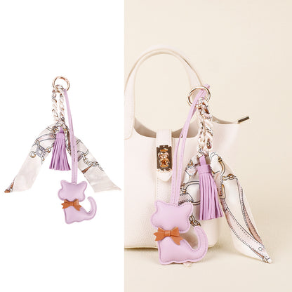 Handmade cat charm for personalizing everyday bags