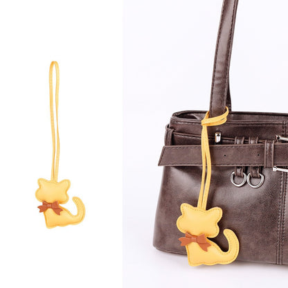 Cute cat pendant with a flowing scarf