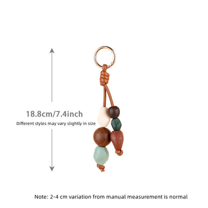 Decorative bead hanger for a purse or everyday carry bag