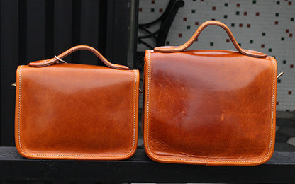 Vintage Crossbody Bag with Floral Embossed Detailing and Adjustable Shoulder Strap