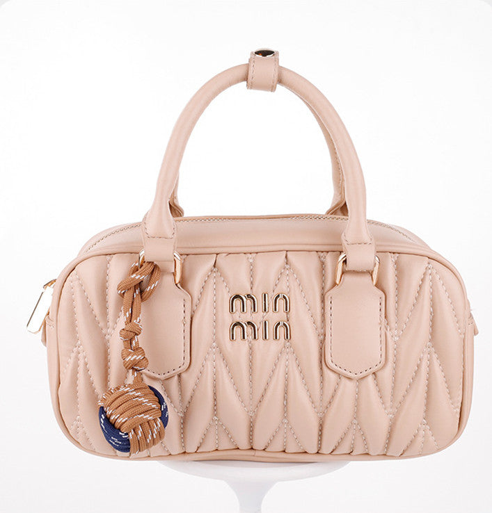 Handmade woven cord charm for handbags and everyday bags