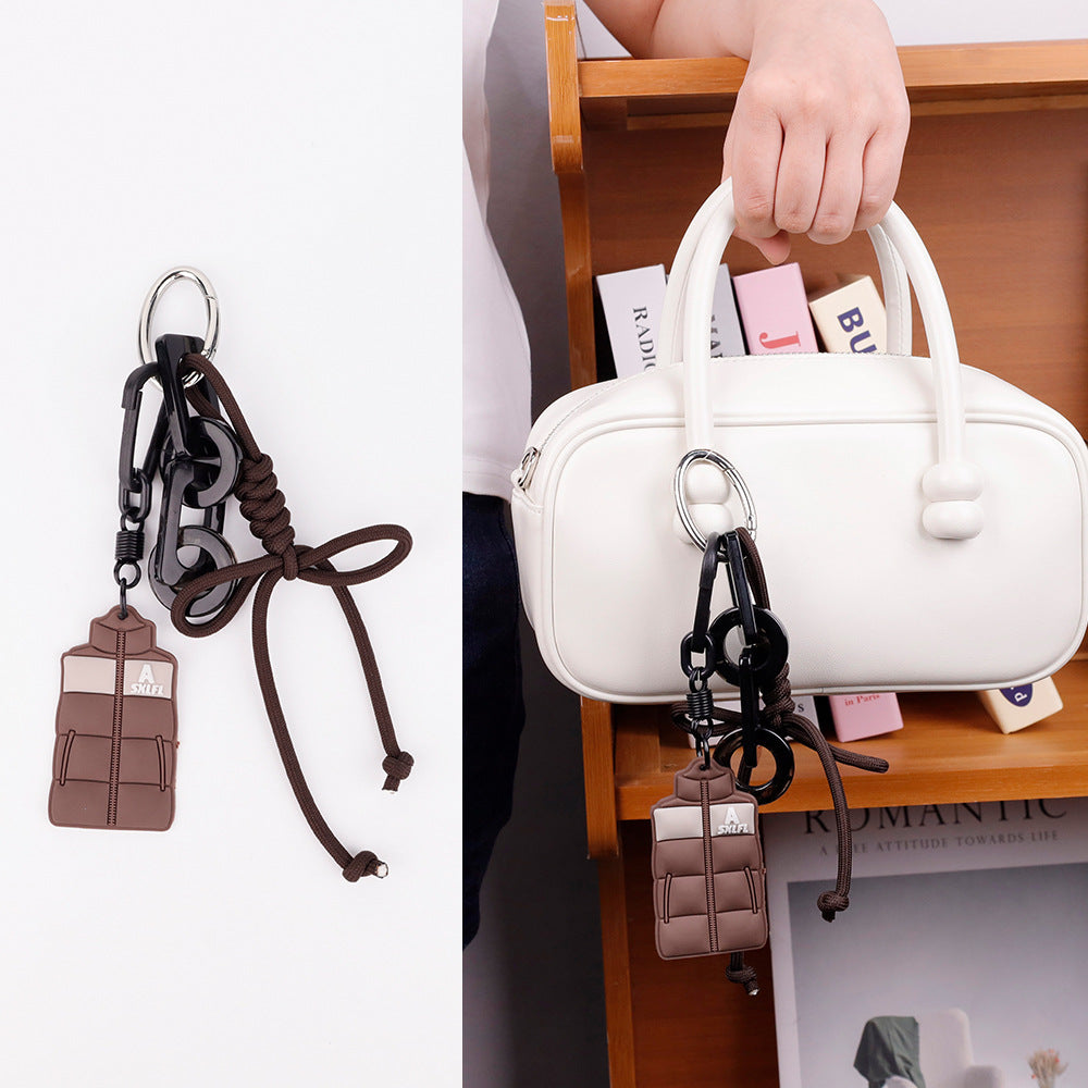 Compact bag charm for decorating a backpack zipper