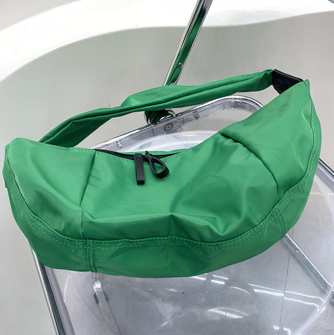 Lightweight curved crossbody purse for weekend adventures