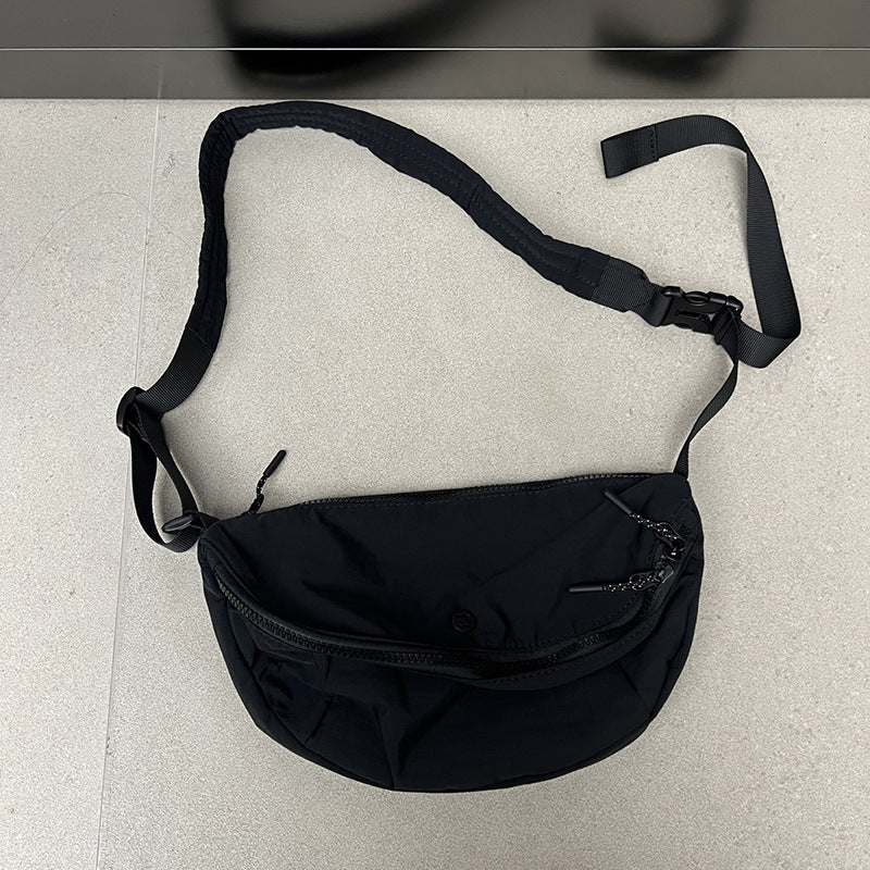 Compact crossbody pouch for daily essentials