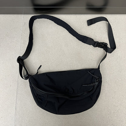 Compact crossbody pouch for daily essentials