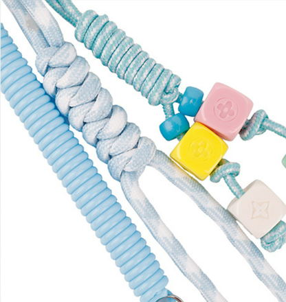 Colorblock pony purse attachment with woven string trim