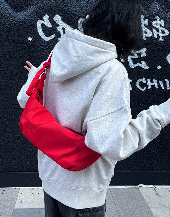 Wide-strap crossbody pack for comfortable movement