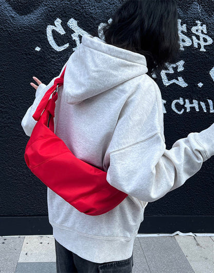 Wide-strap crossbody pack for comfortable movement