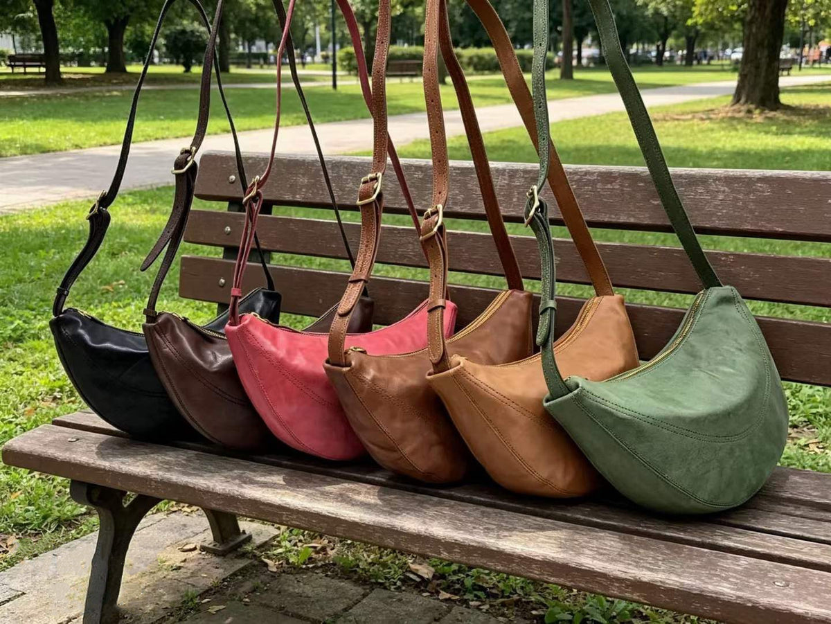 Curved cowhide bag for casual lunches and coffee stops