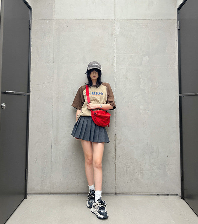Compact sling bag for hands-free carrying