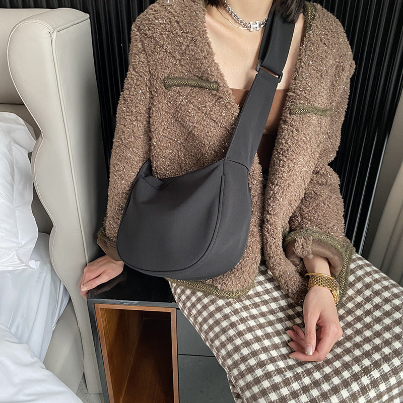 Compact shoulder bag for coffee runs and quick trips