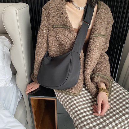 Compact shoulder bag for coffee runs and quick trips
