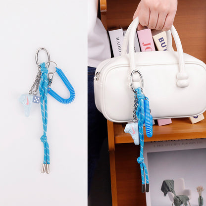 Sporty rope accessory clipped onto a casual backpack