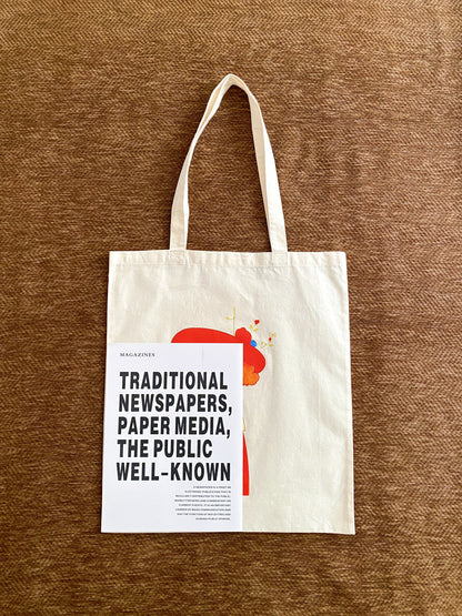 Sustainable tote wrapped as a meaningful holiday present.