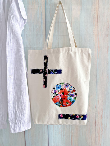 Durable canvas bag with original patchwork chosen for a textile collector who values artisan work.