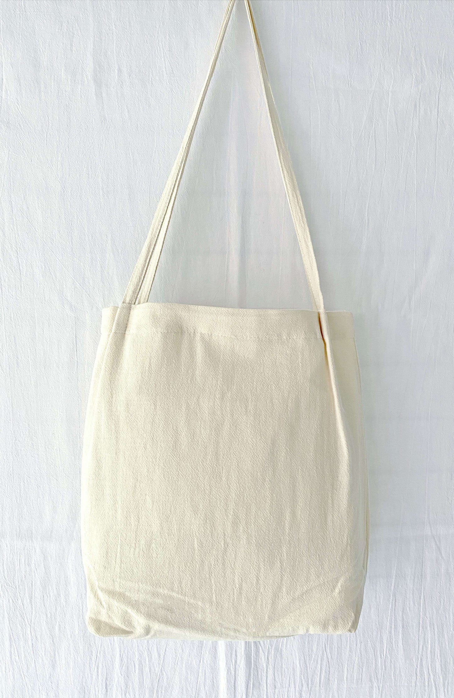 Natural cotton linen bag with floral embroidery, a unique gift for loved ones