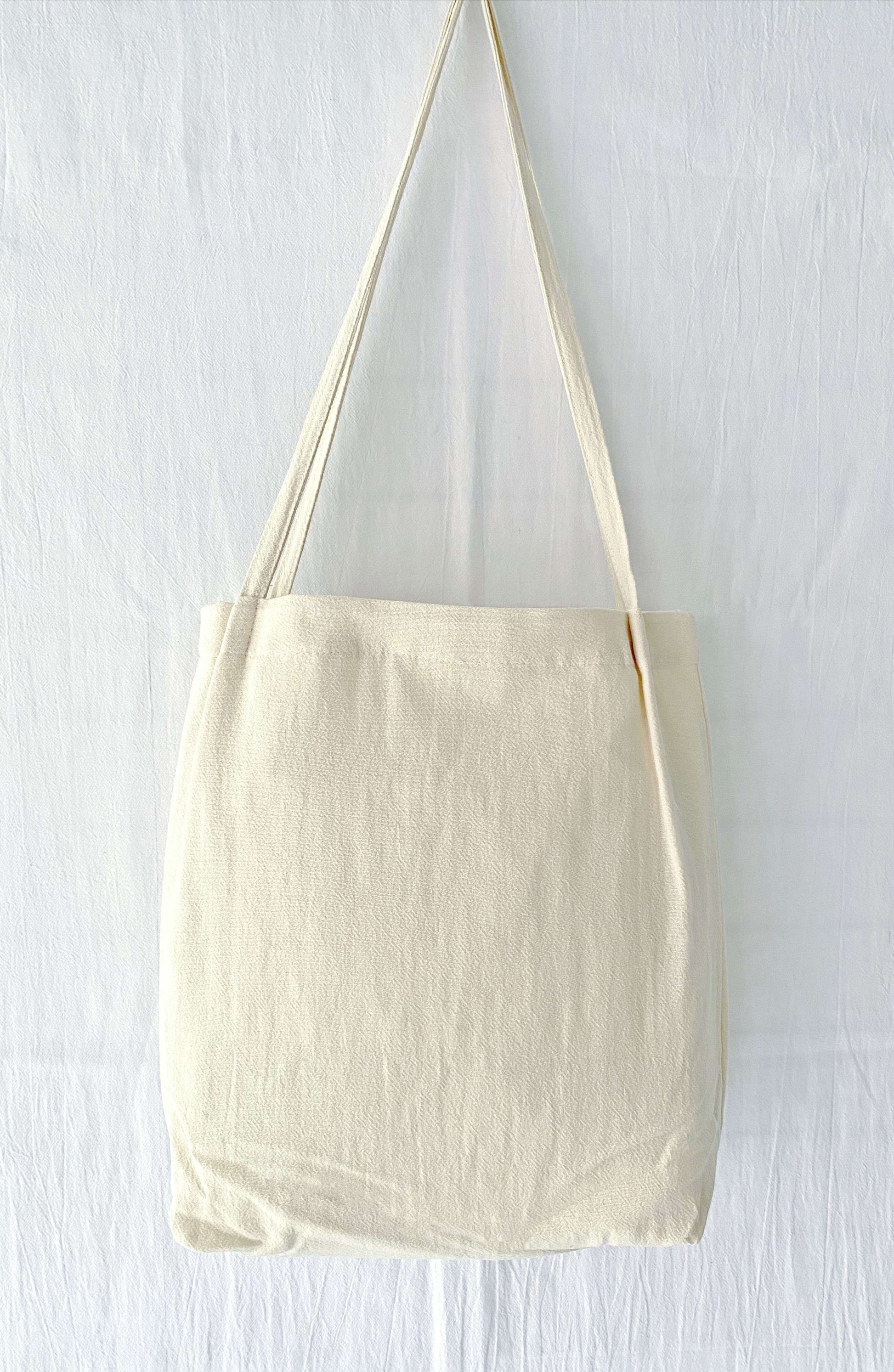 Natural cotton linen bag with floral embroidery, a unique gift for loved ones