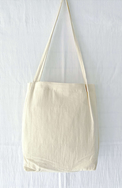 Natural cotton linen bag with floral embroidery, a unique gift for loved ones