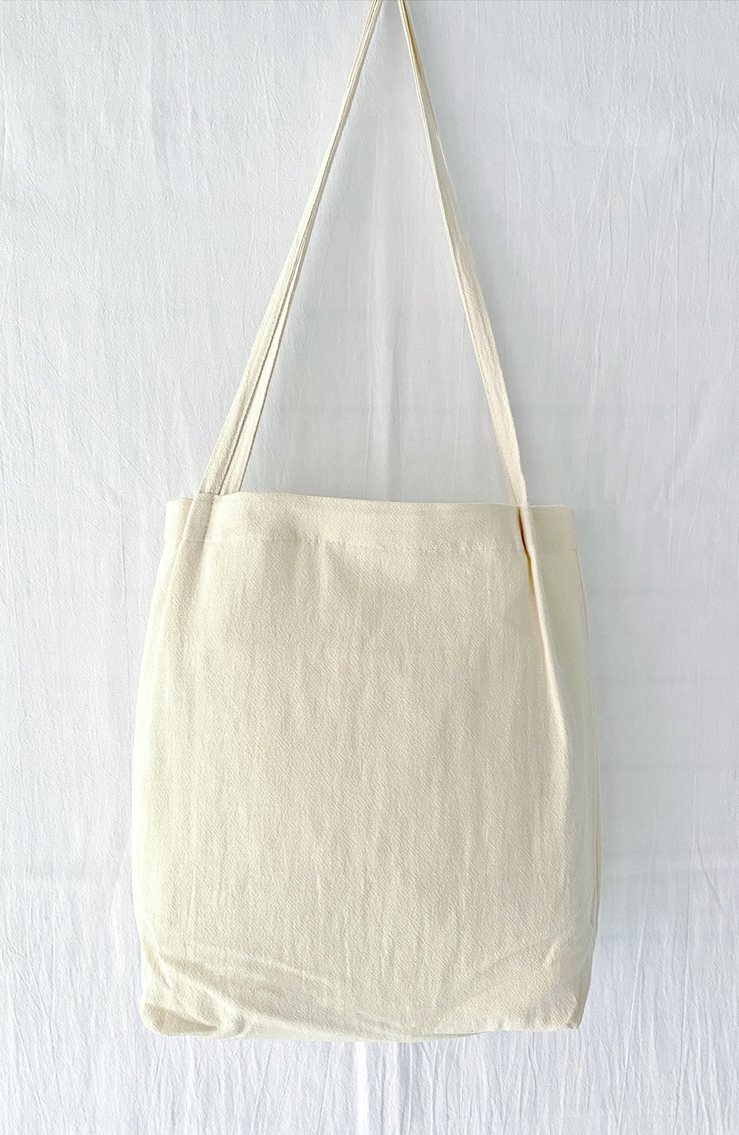 Natural cotton linen bag with floral embroidery, a unique gift for loved ones