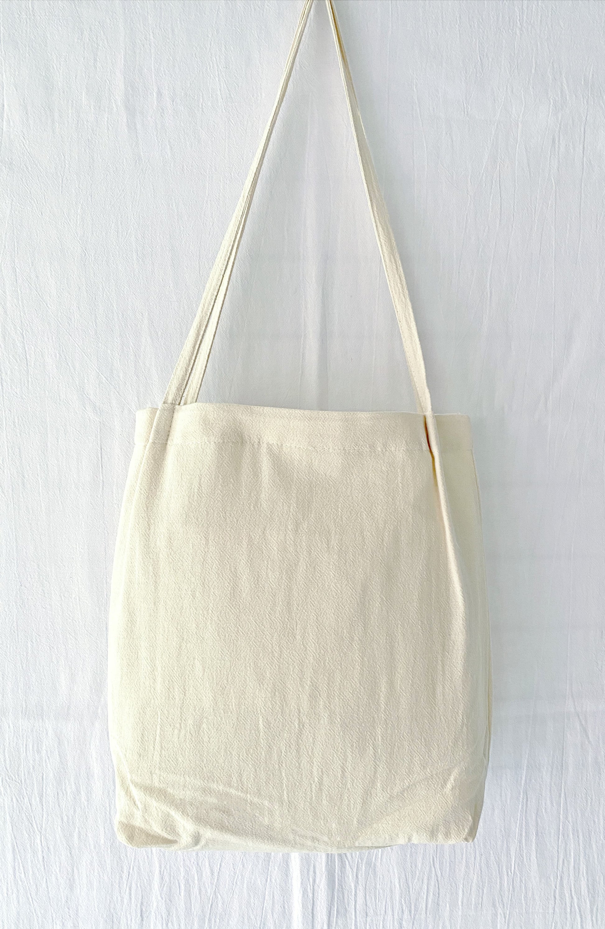 Natural cotton linen bag with floral embroidery, a unique gift for loved ones